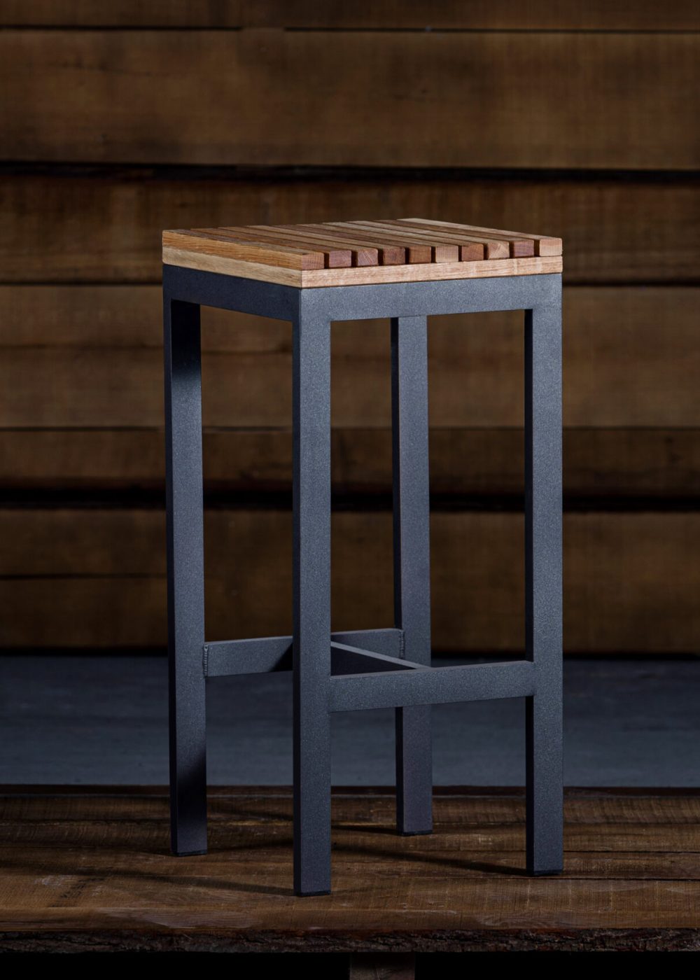 A closeup of a bar stool in loft style